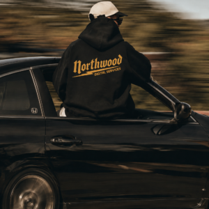 Northwood Digital Services black hoodie with gold back print